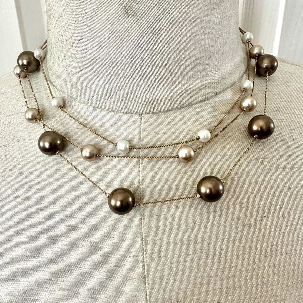 Faux pearl gold tone multi strand necklace